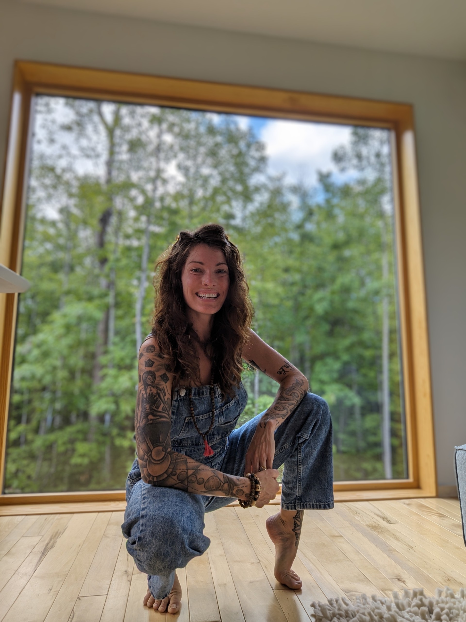 a woman with tattoos on her body