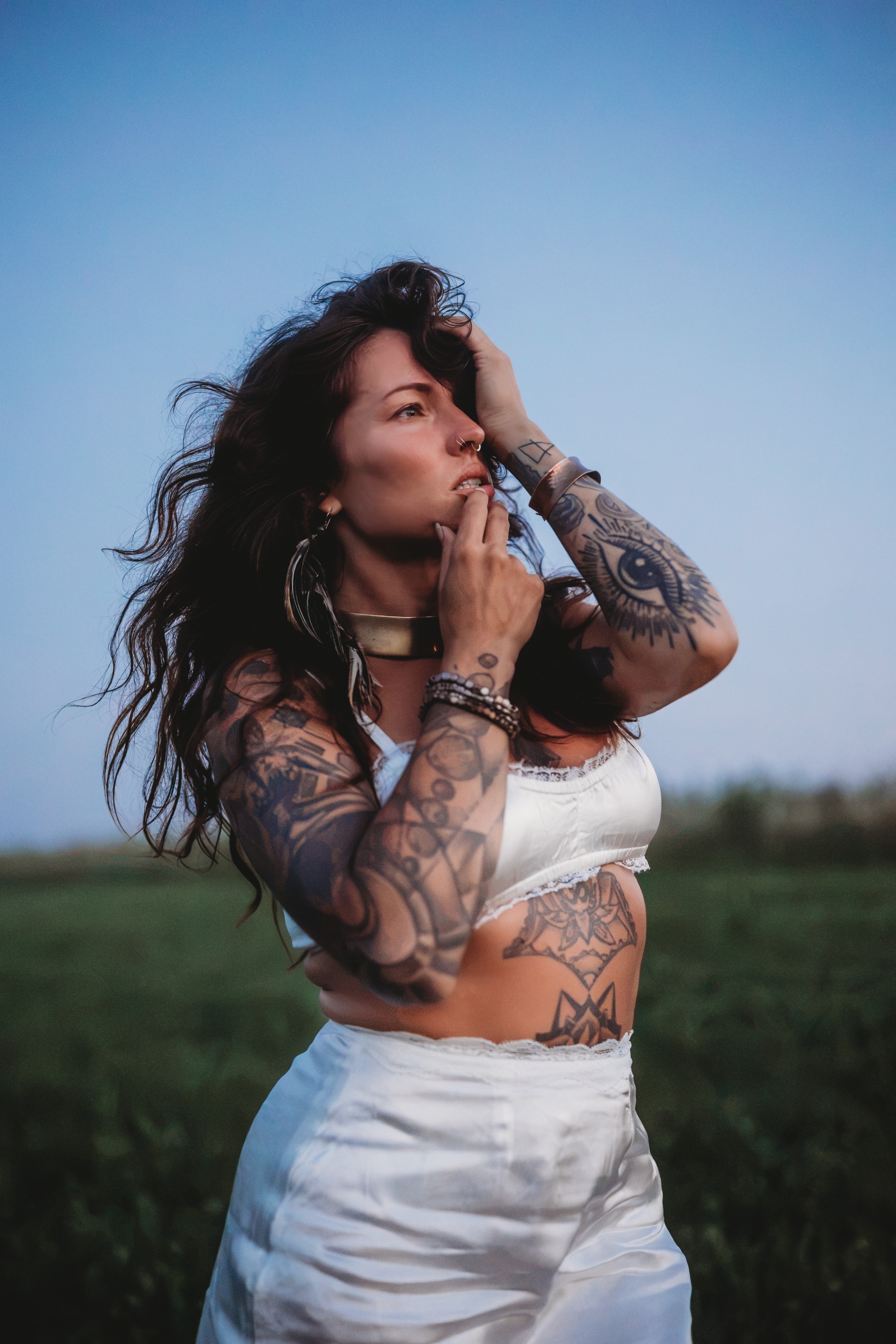 a woman with tattoos on her body