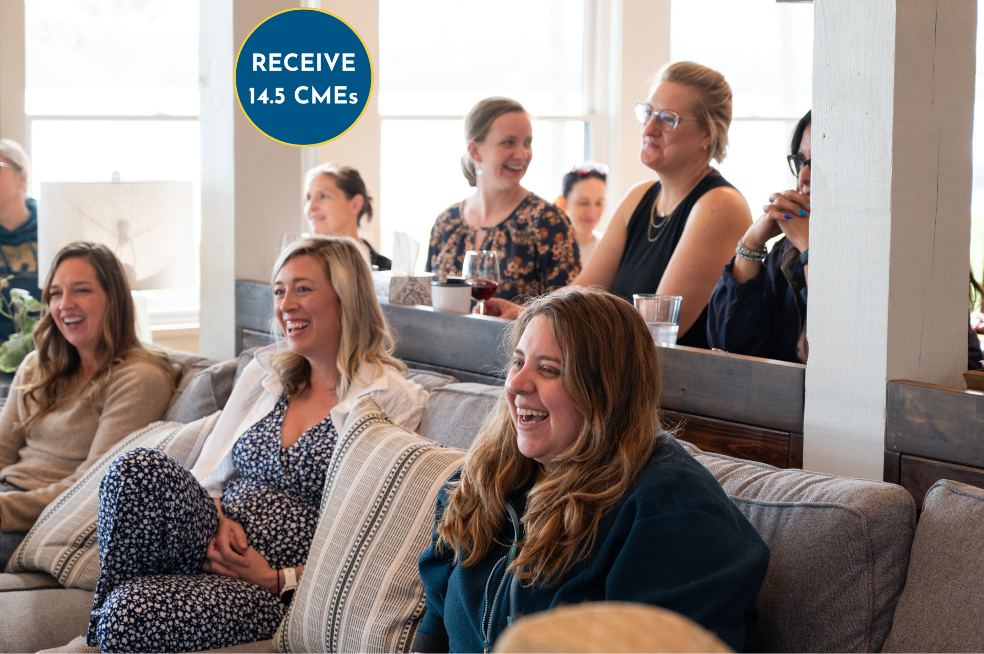 a group of women sitting on a couch