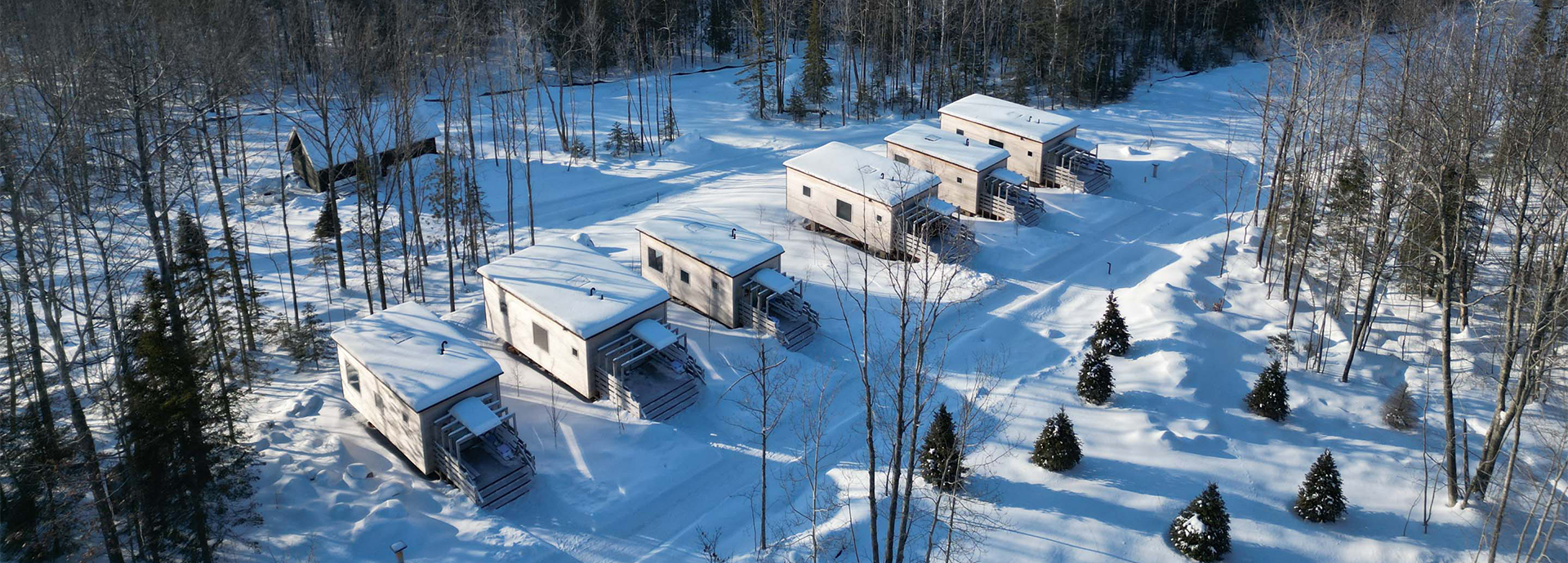 a group of houses in the snow