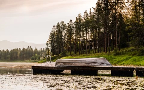 a wooden dock over a lake