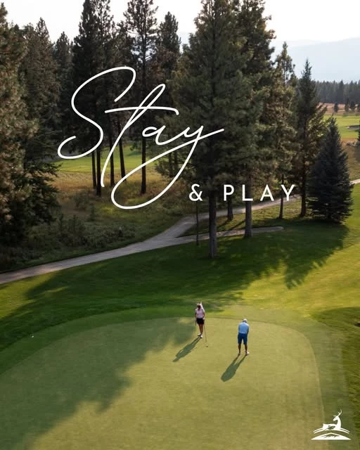 a couple of people on a golf course