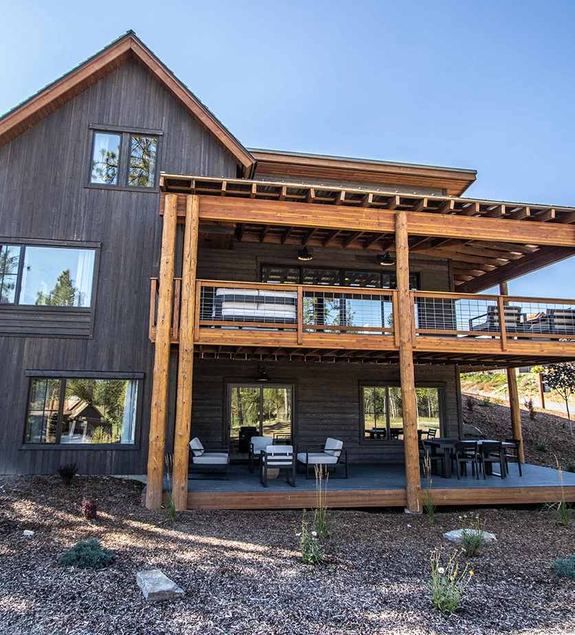 a house with a deck and patio