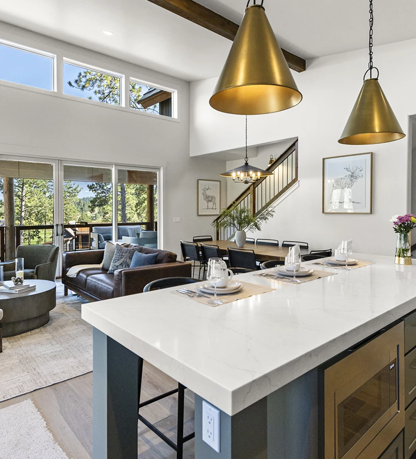 a kitchen and living room with a large open floor plan