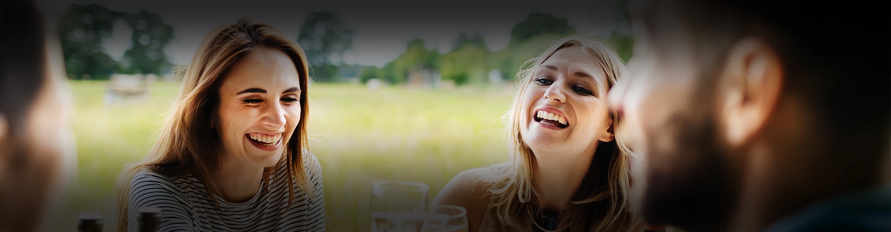 a couple of women laughing