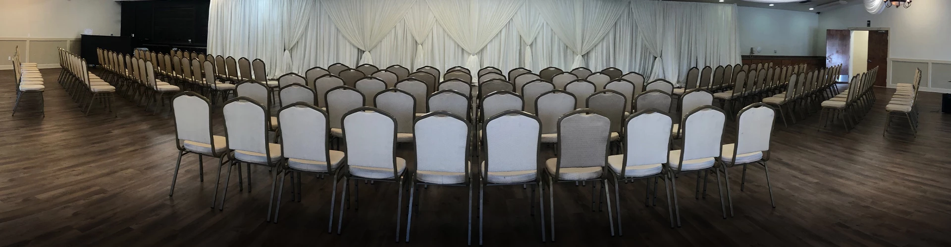 a room with rows of chairs