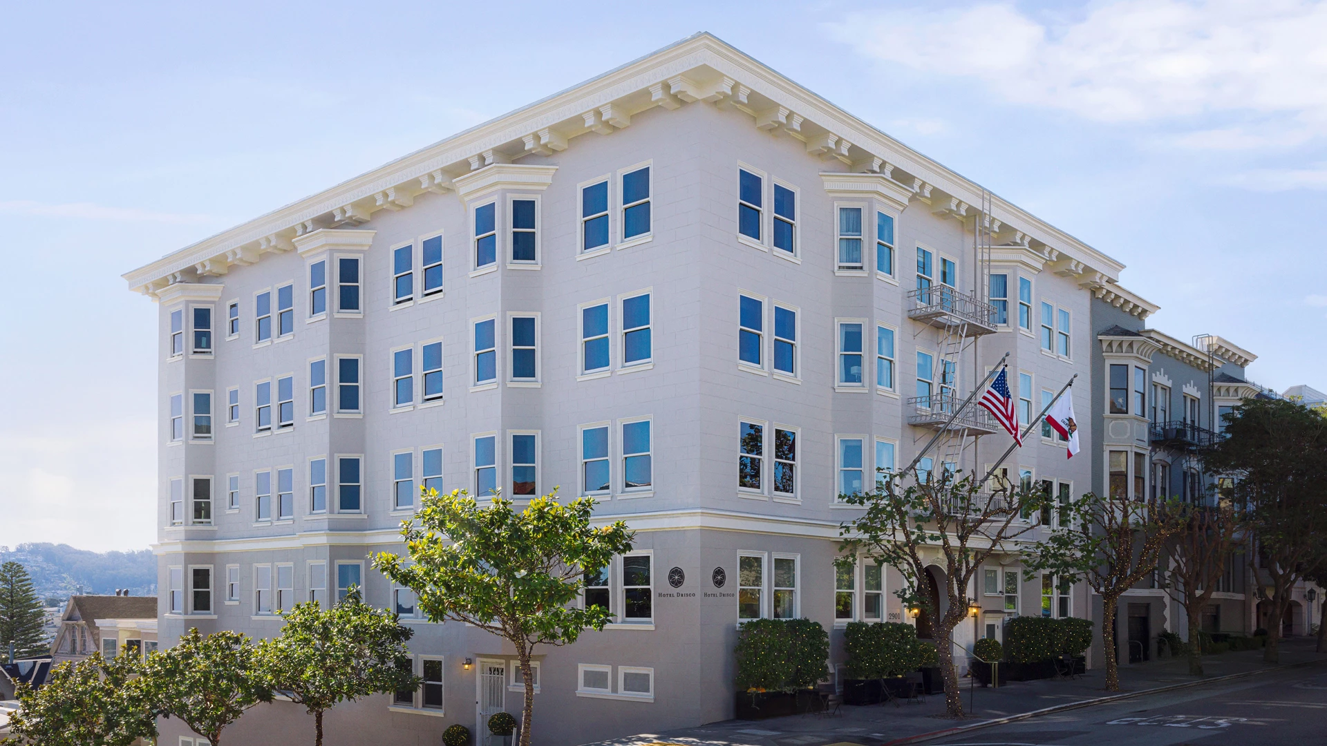 a building with a flag on the corner