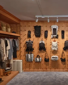 a room with clothes on the wall