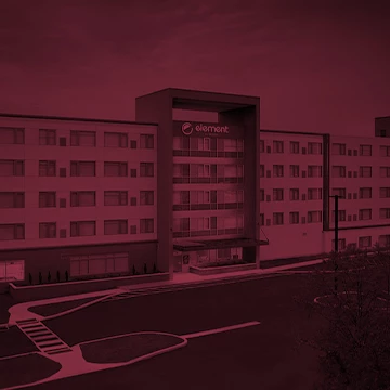 a building with a parking lot