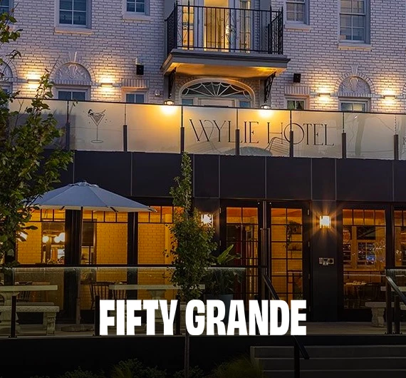 Balcony and patio with umbrellas at The Wylie Hotel in Midtown Atlanta