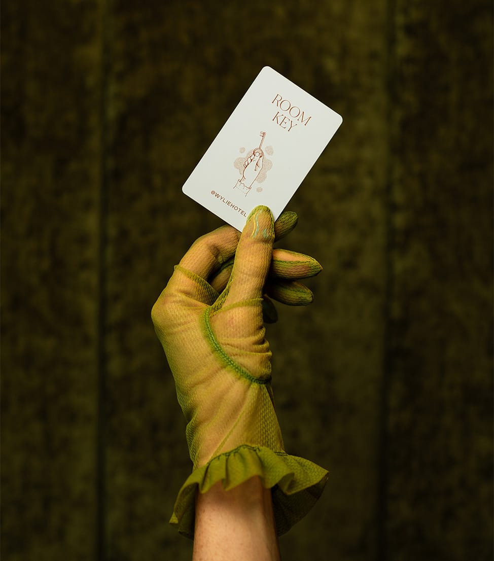 a hand holding a piece of paper