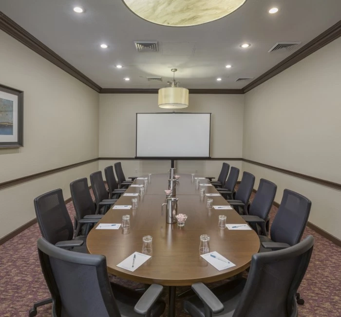 compass  room with a table and chairs