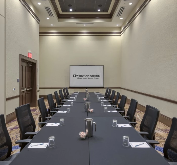 discovery meeting venue with a long table and chairs all around it