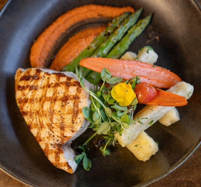 a plate of food with vegetables