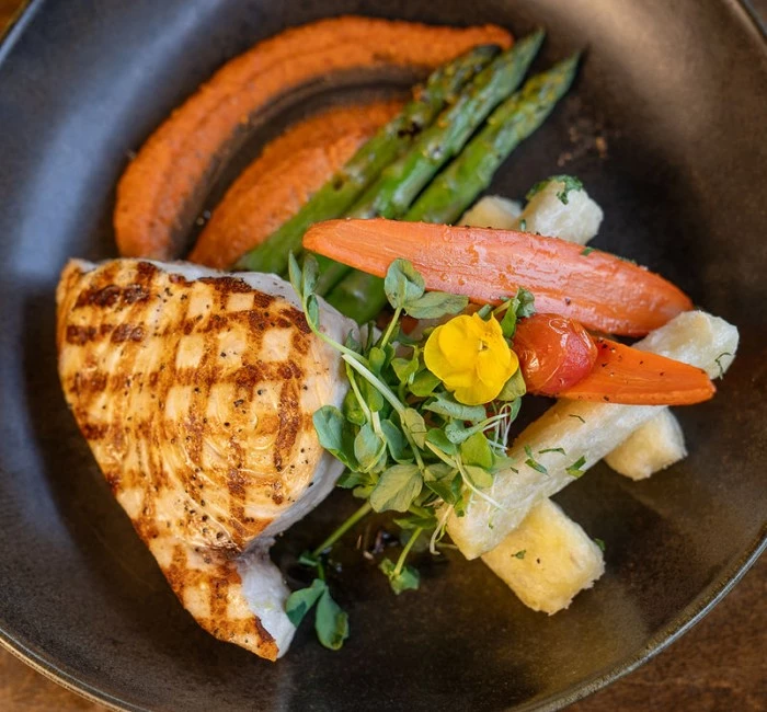 a plate of food with vegetables