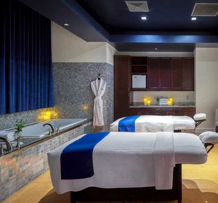 a spa room with two massage beds, perfect for couples massages