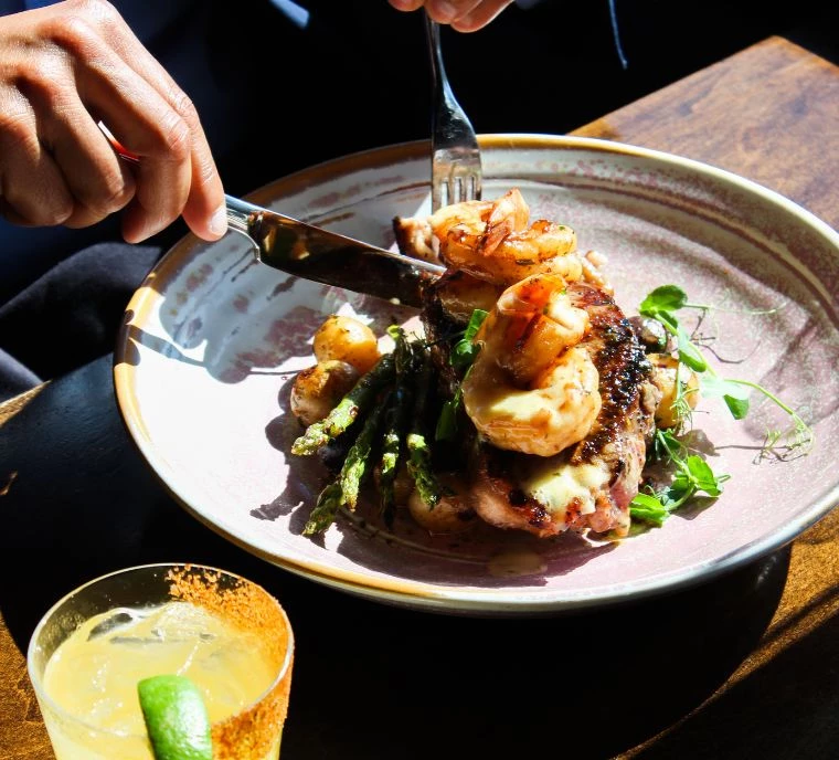 a plate of food with a fork and knife