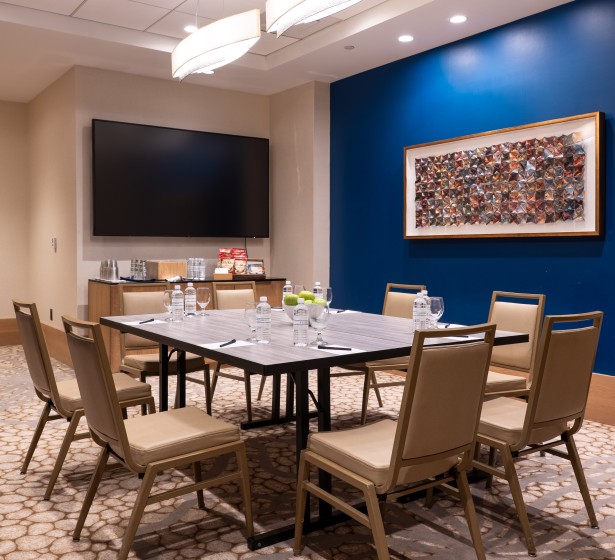 a room with a table and chairs