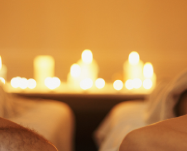 a blurry image of a couple of people lying down