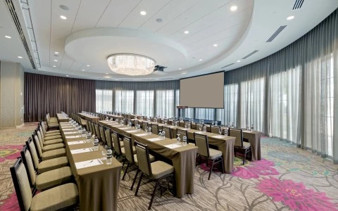 a room with tables and chairs