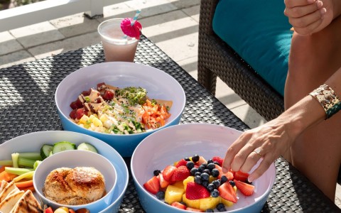 a person eating food on a table