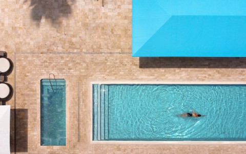 a person swimming in a pool