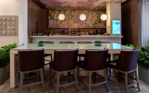 a room with a table and chairs