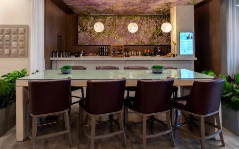 a room with a table and chairs