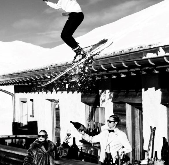 a person jumping off a ski board