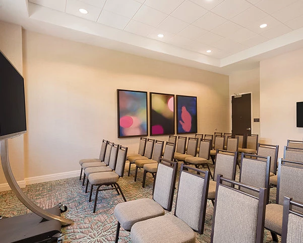 rows of chairs in an event room