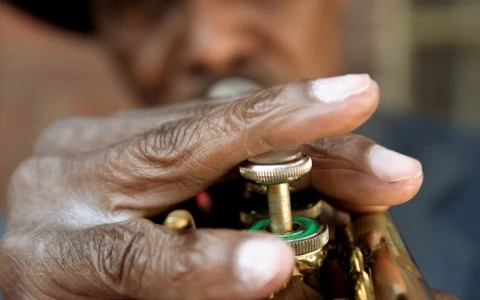 man playing the trumpet