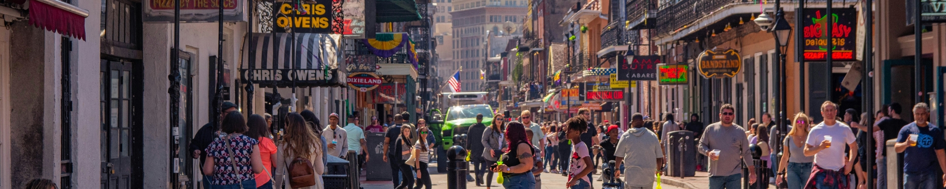 a group of people walking on a street