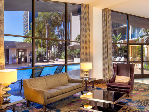 a room with a pool and a couch