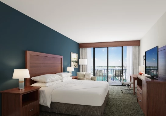 a room with a bed and a desk