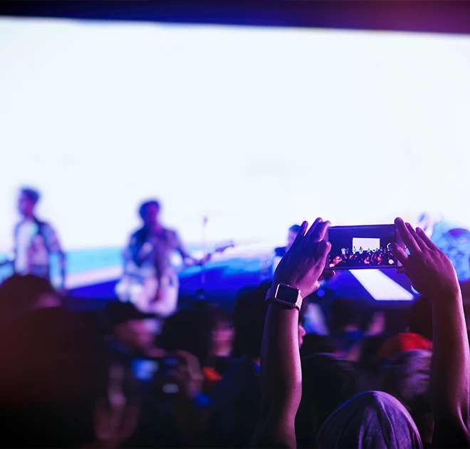 a group of people in a concert