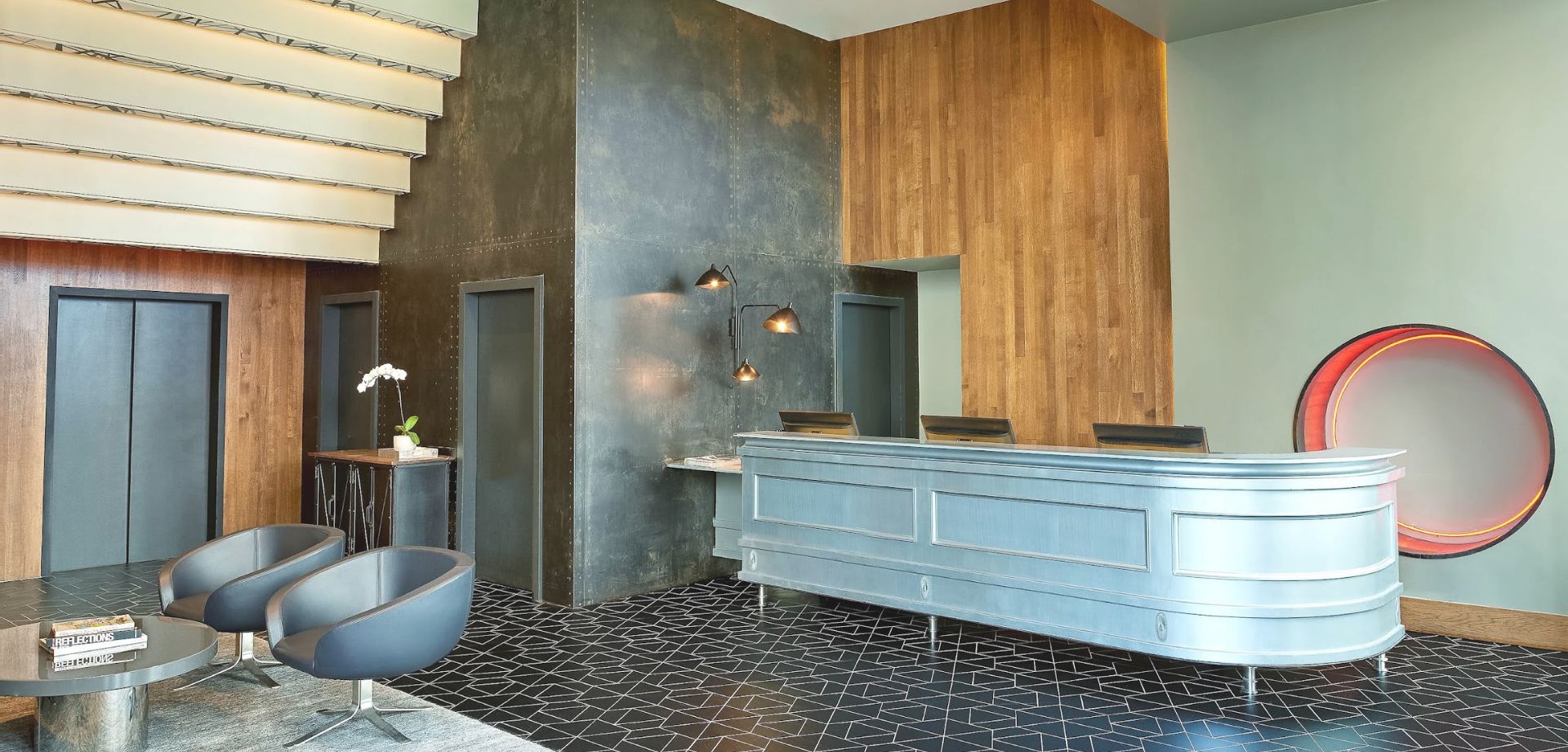 a room with a counter and stairs