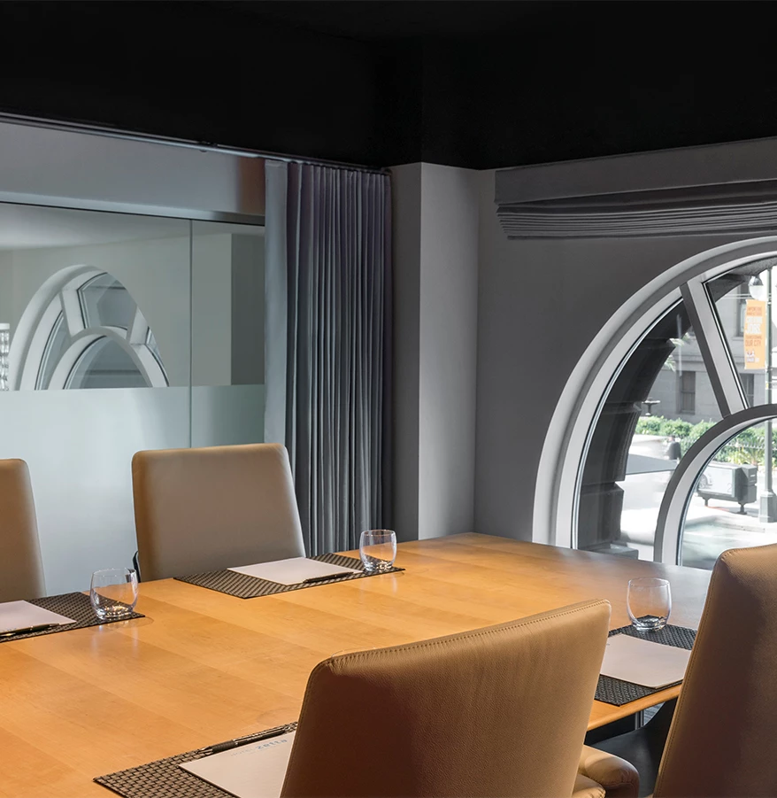 a room with a table and chairs