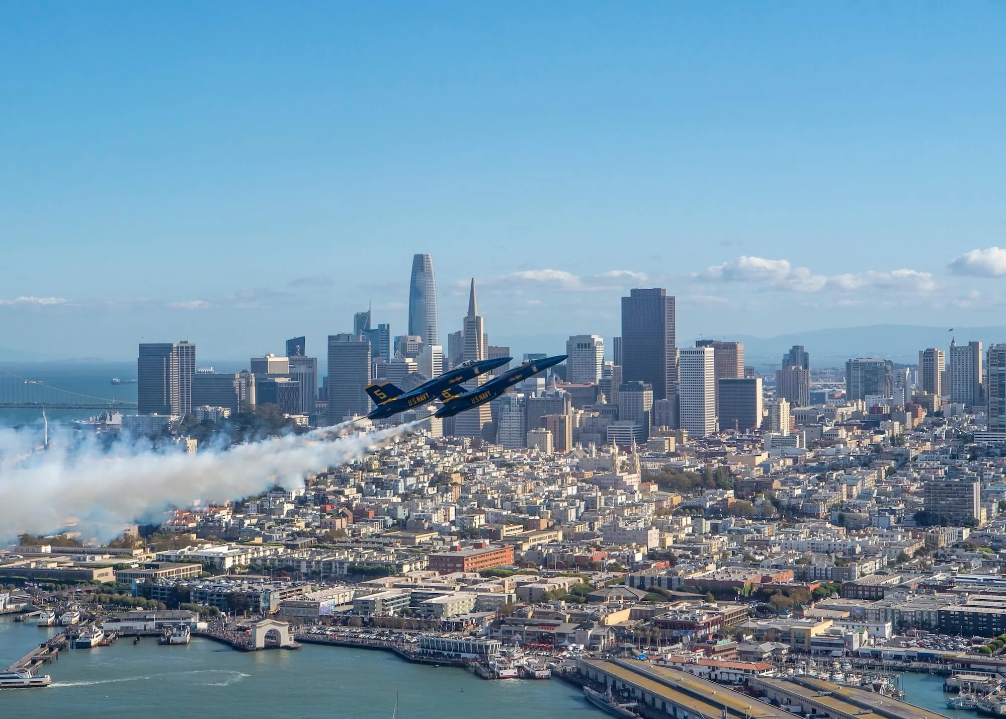 a plane flying over a city