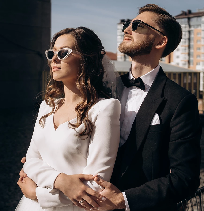 a man and woman in sunglasses