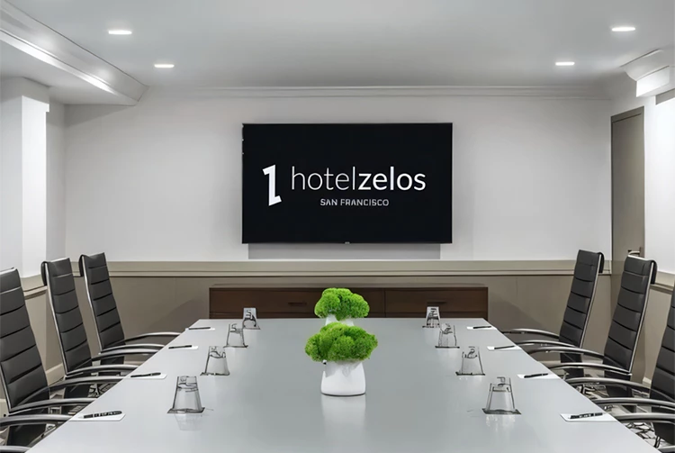 a conference room with a large screen