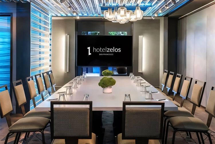 a conference room with a large table and chairs