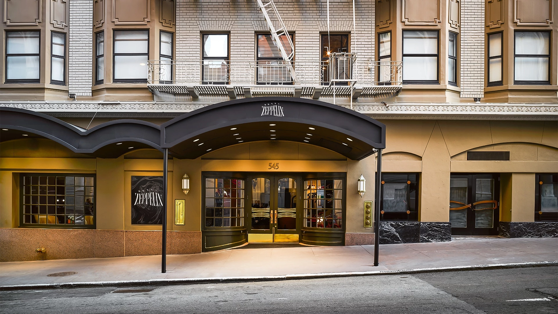 a building with a black awning