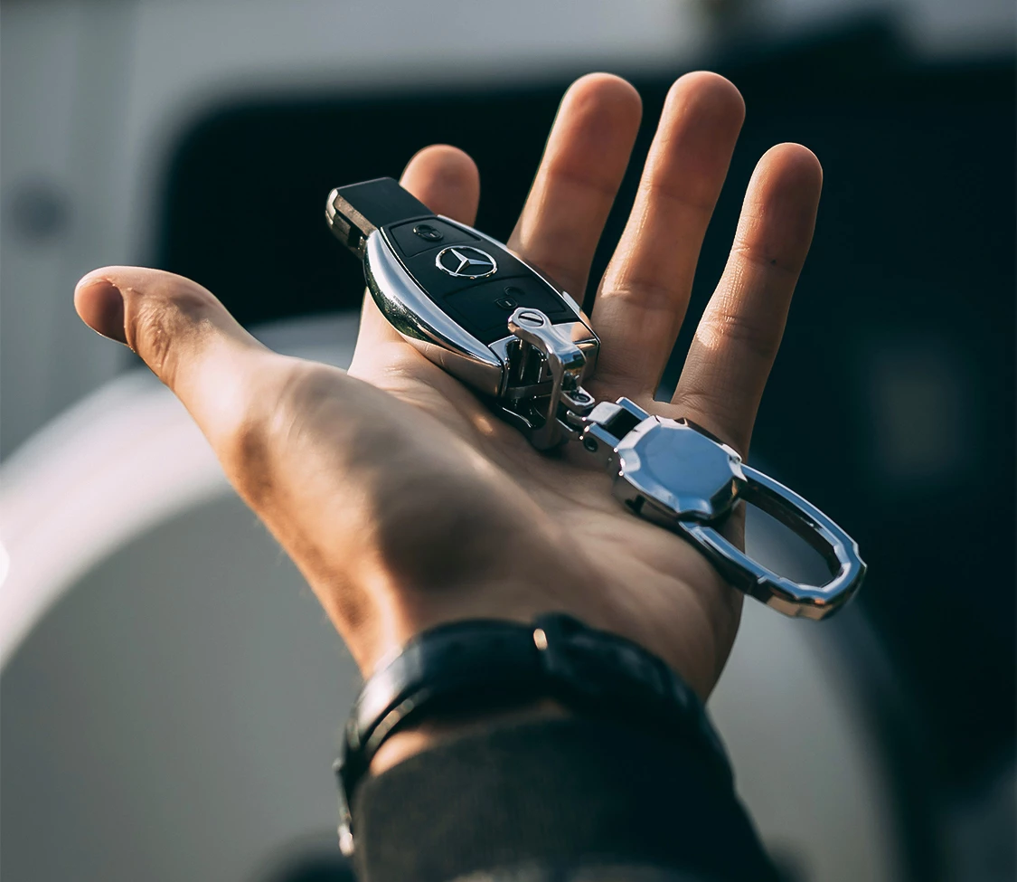 a hand holding a key