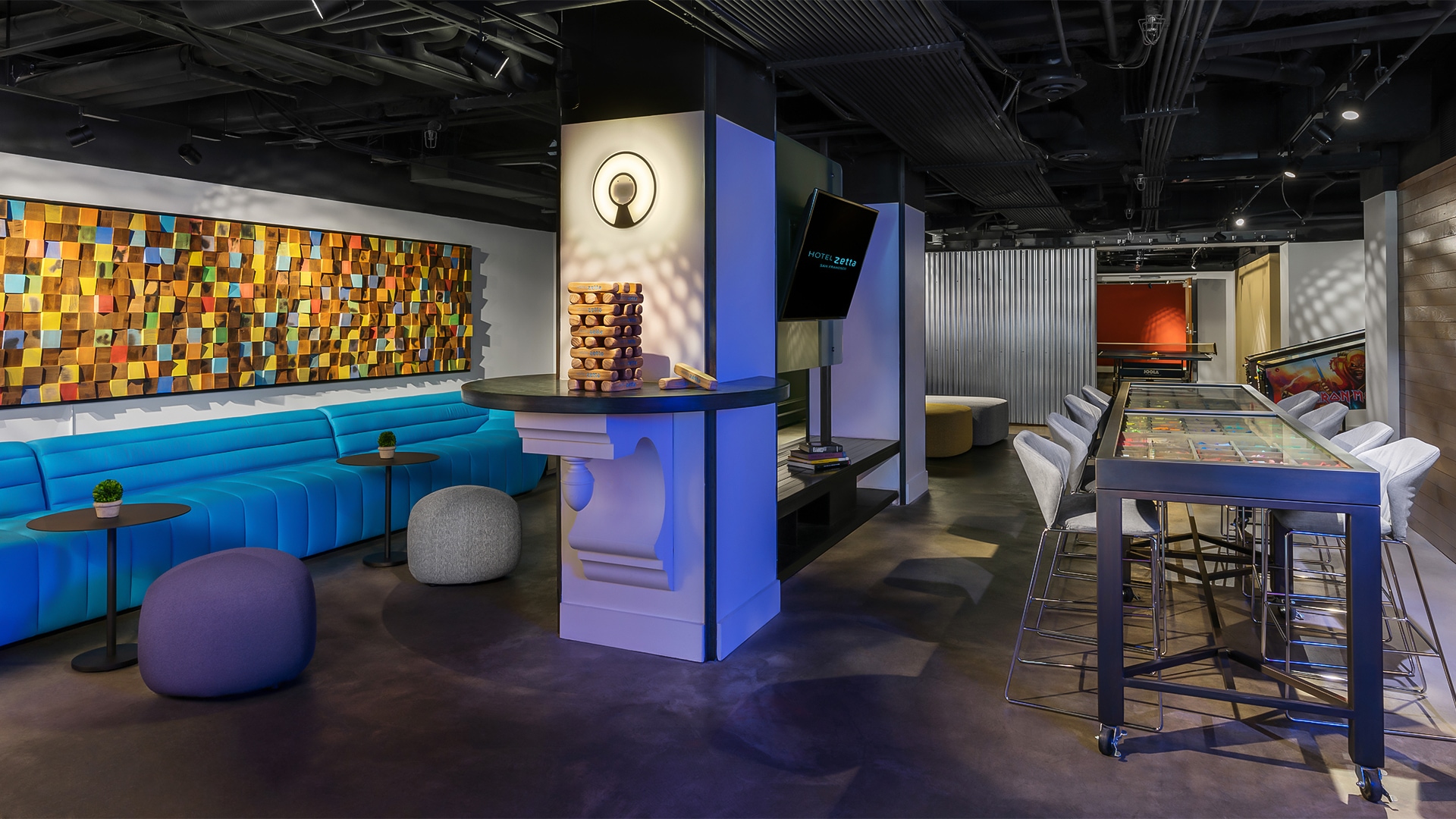 a room with a bar and a table