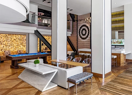 a room with a pool table and a pool table