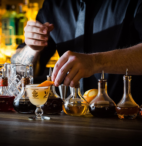 a person making a drink