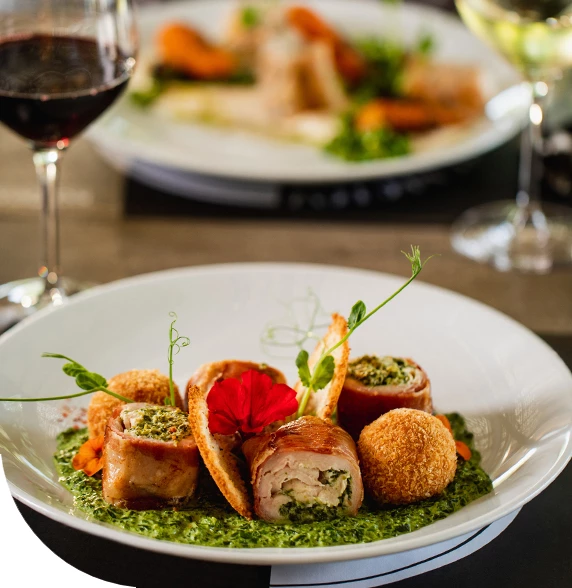 a plate of food and wine