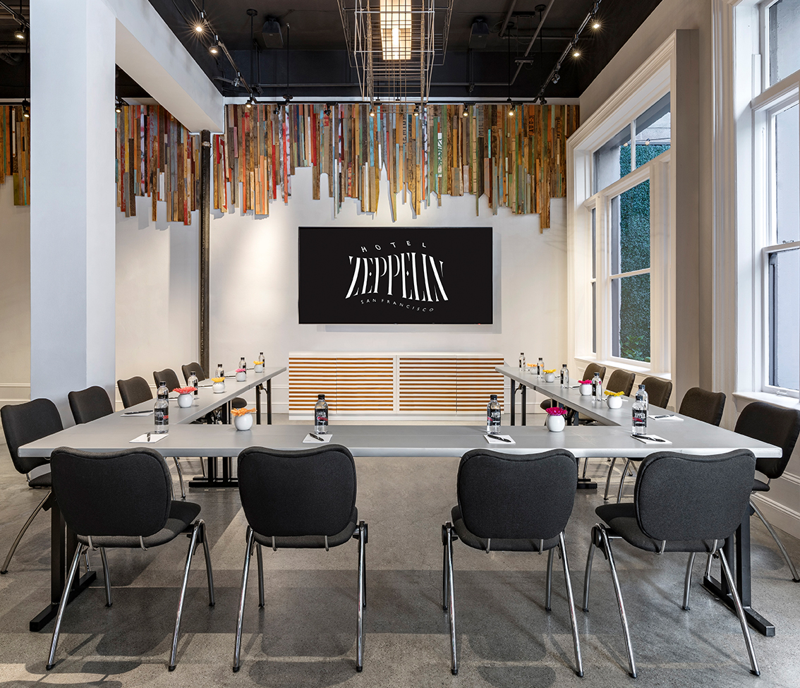 a room with a table and chairs