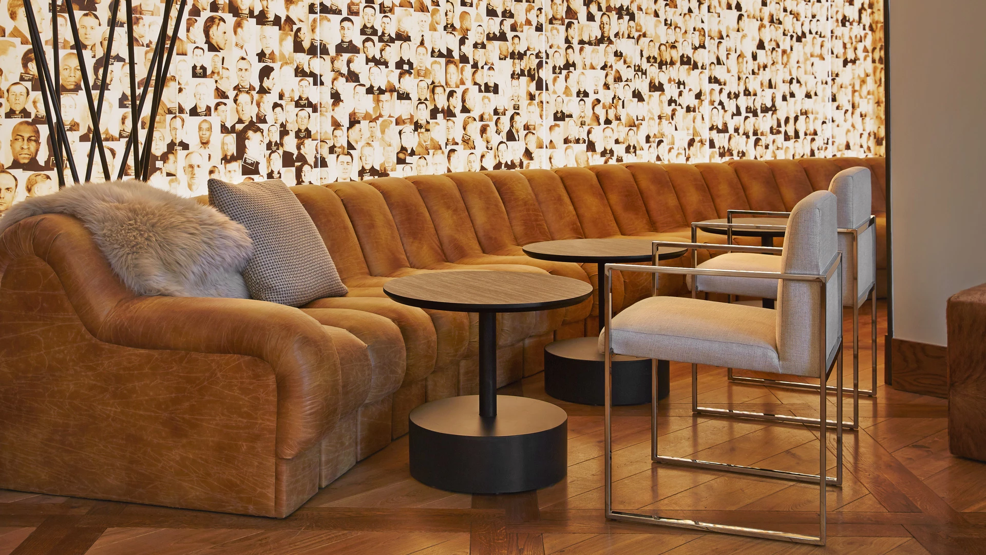 a couch with a table and chairs