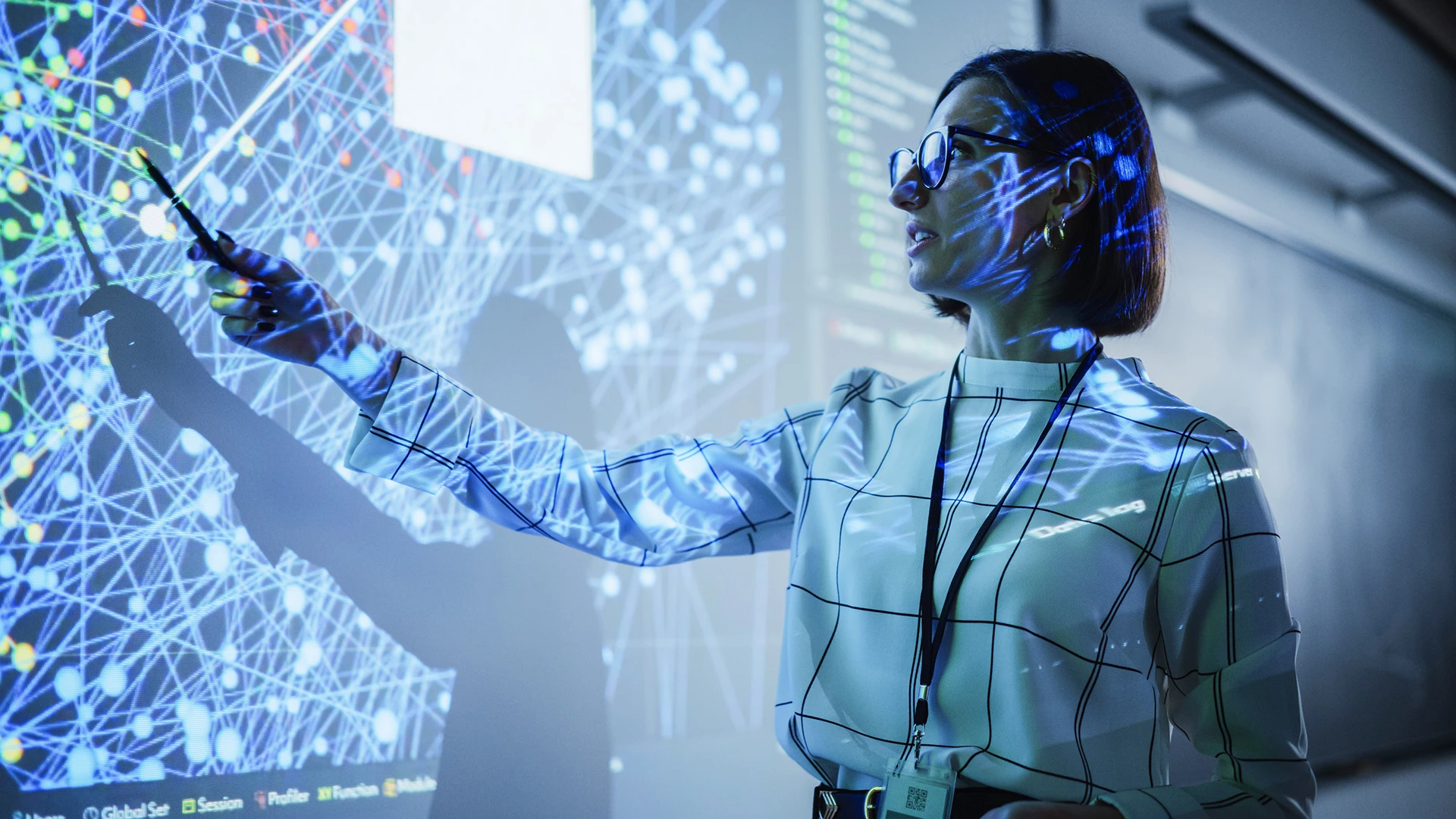 a woman using a large screen